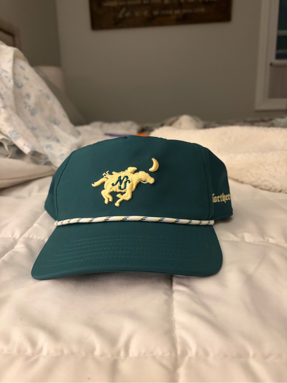 Adidas’s Rope-Trim Golf Cap with Yellow Embroidered Rider